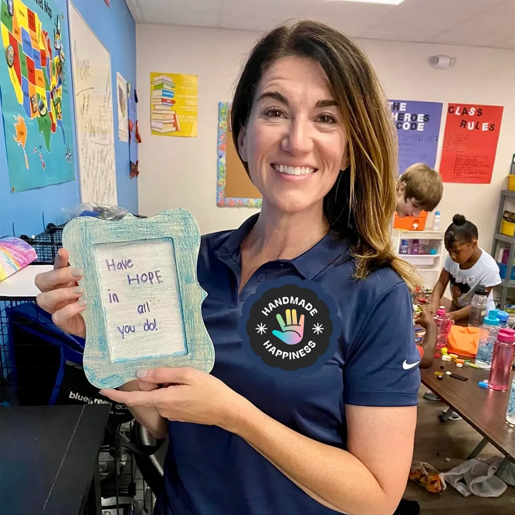 hope wagner holding a sign that says "have hope in everything you do".
